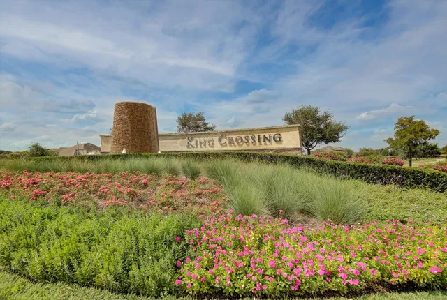 a view of a lake with a garden