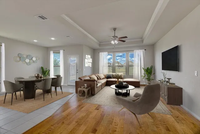 a living room with furniture and a table