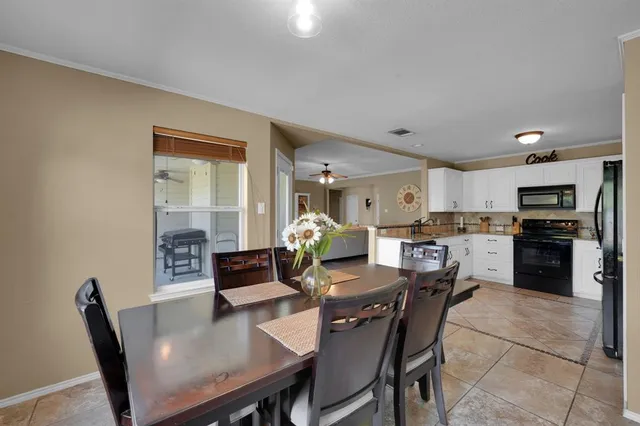 a view of a dining room with furniture