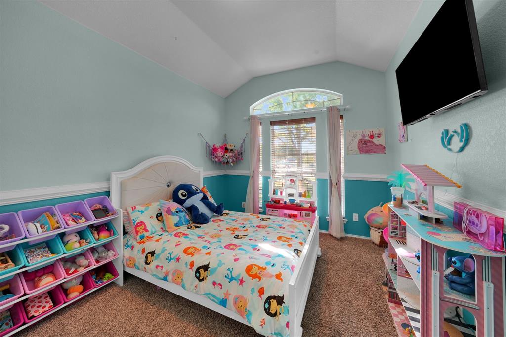 951 Behrens Court Crowley, TX 76036 - Photo 28 of 37 a bedroom with toys and a small space