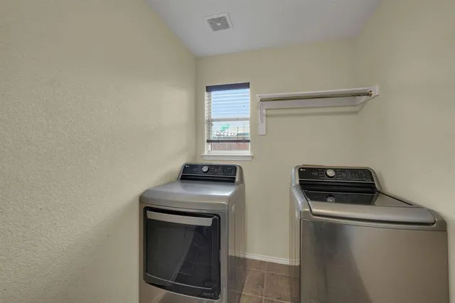a kitchen with a stove and a microwave