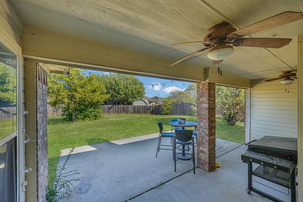 951 Behrens Court Crowley, TX 76036 - Photo 37 of 37 a view of a porch with furniture and garden