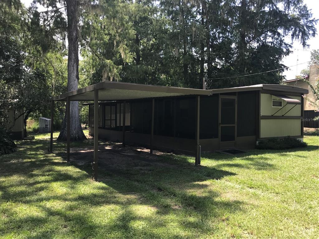 7196 Cr 651 Bushnell Bushnell, FL 33513 - Photo 1 of 1 a view of a house with a yard