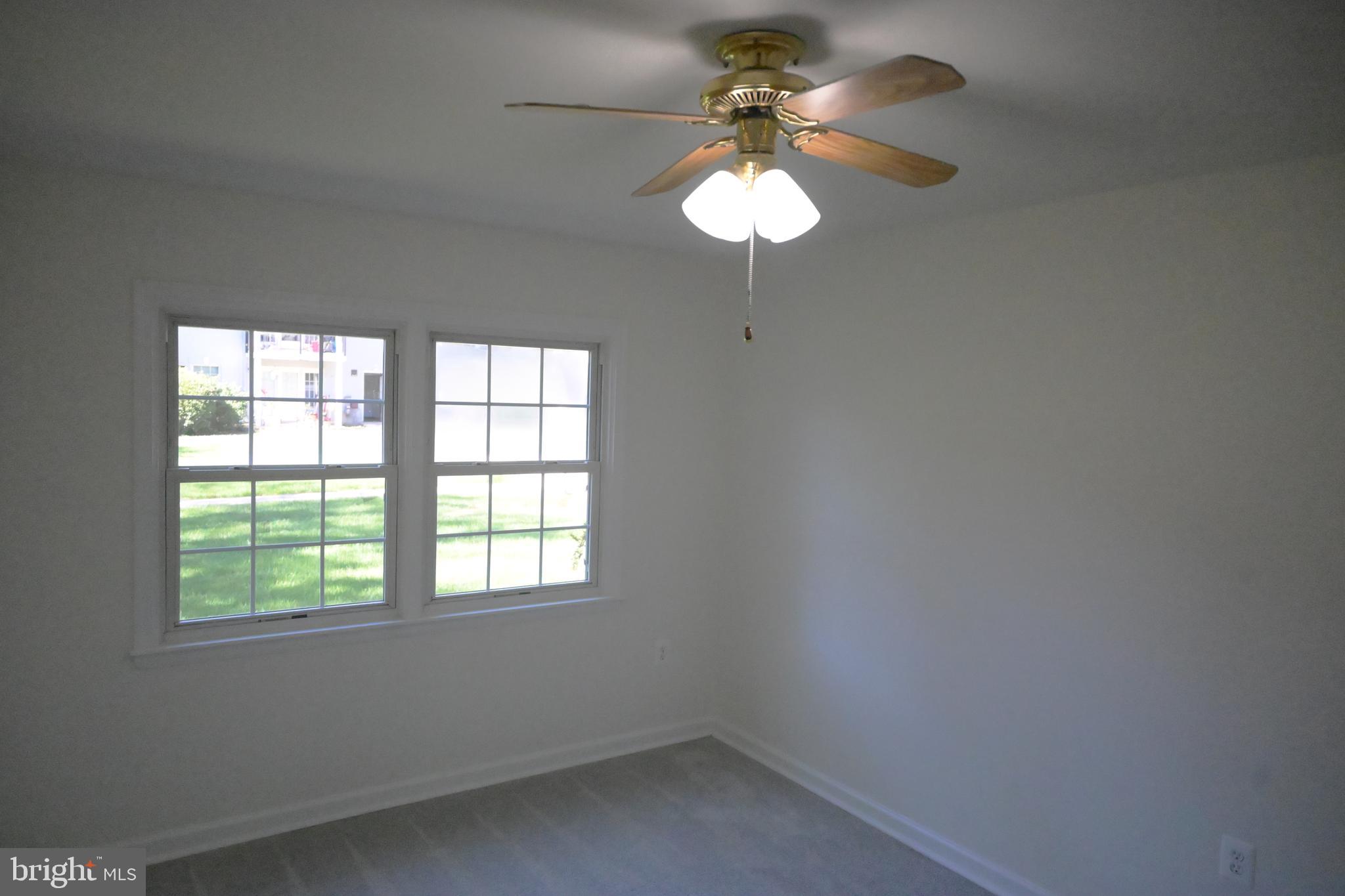 9451 Fairfax Boulevard, Unit 102 Fairfax, VA 22031 - Photo 23 of 26 an empty room with a window