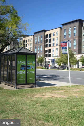 a view of a patio with a table and chairs