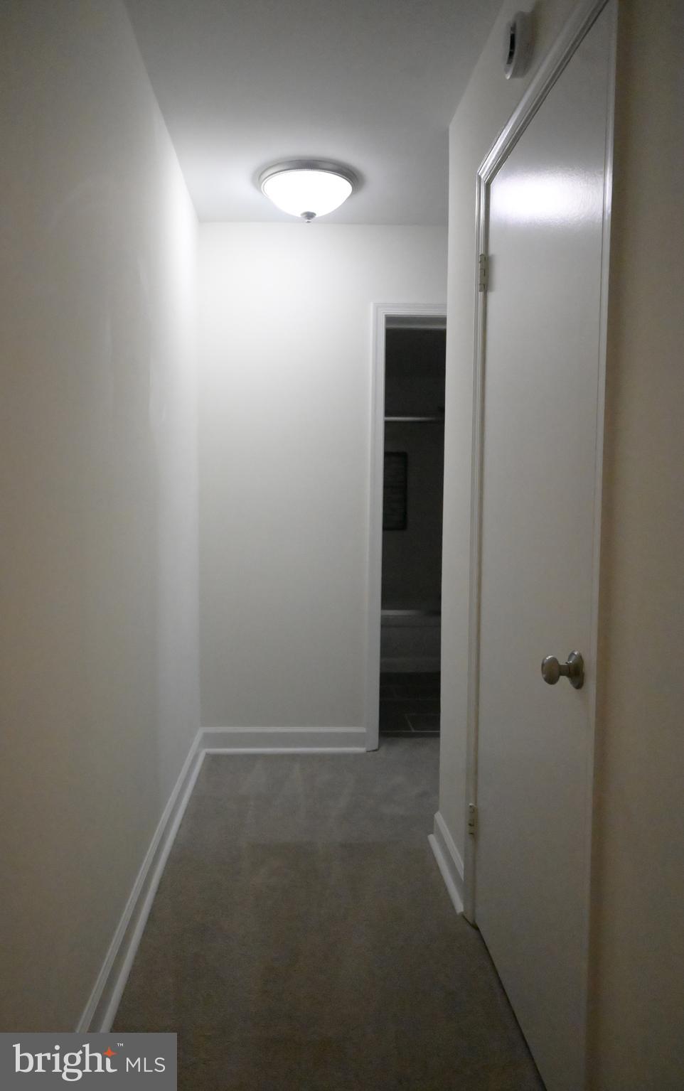 9451 Fairfax Boulevard, Unit 102 Fairfax, VA 22031 - Photo 8 of 26 a view of hallway with closet