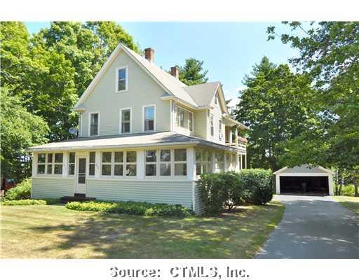 a view of a yard in front of house
