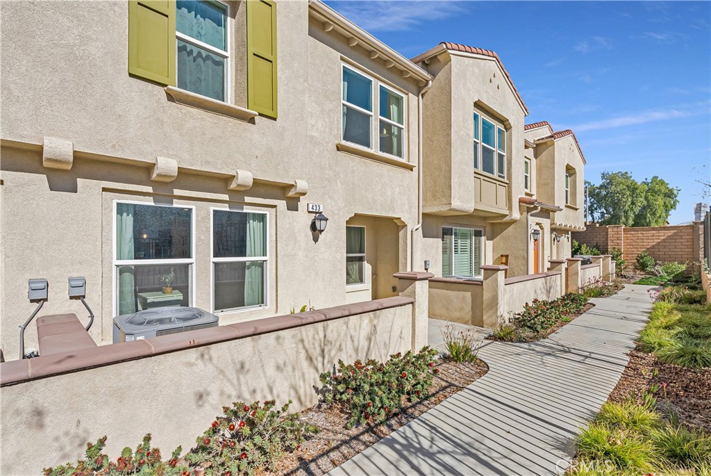 a front view of a multi story residential apartment building