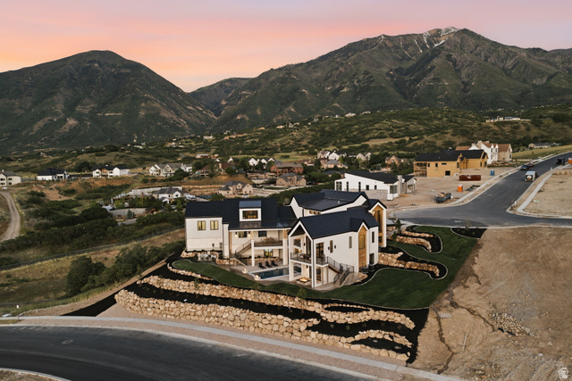 923 North Emery Lane Elk Ridge, UT 84651 - Photo 97 of 101 Contemporary residence featuring a striking black roof and light-colored siding