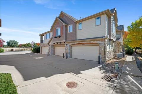 a view of a house with a street