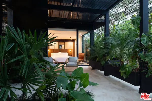 a view of a balcony with wooden floor