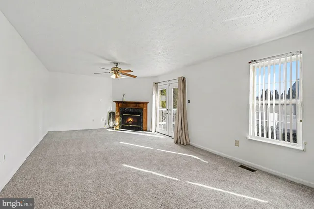 a view of a livingroom with a fireplace