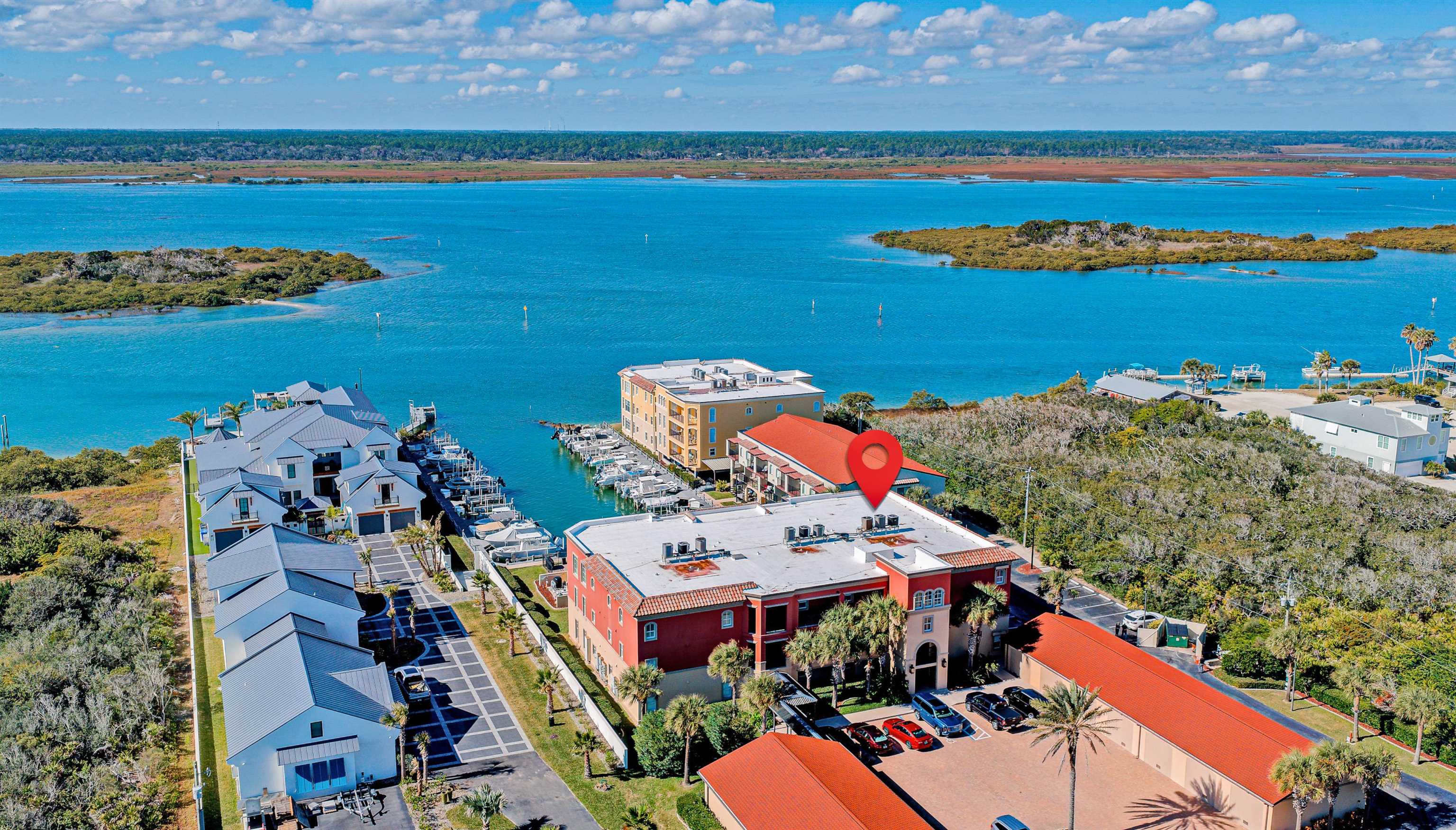 115 Sunset Harbor Way, Unit 303 St. Augustine, FL 32080 - Photo 2 of 76 an aerial view of a houses with outdoor space