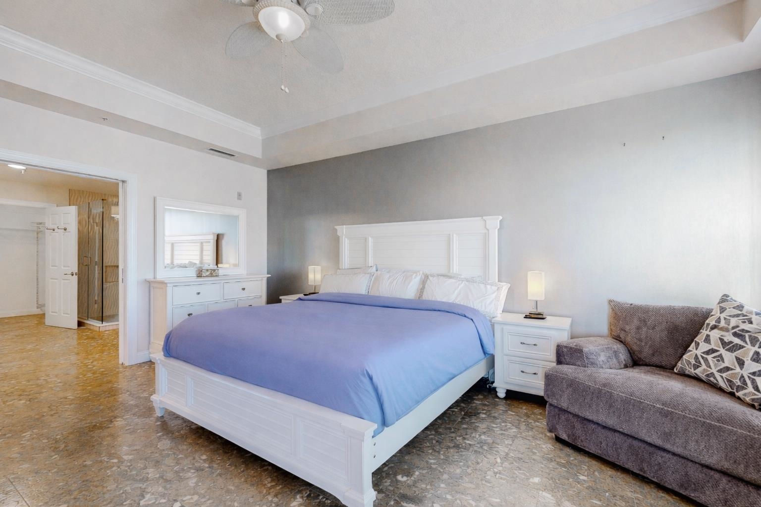 115 Sunset Harbor Way, Unit 303 St. Augustine, FL 32080 - Photo 27 of 76 a bedroom with a bed and couch