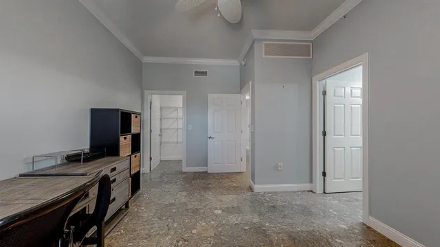 a view of a swimming pool with a lounge chairs