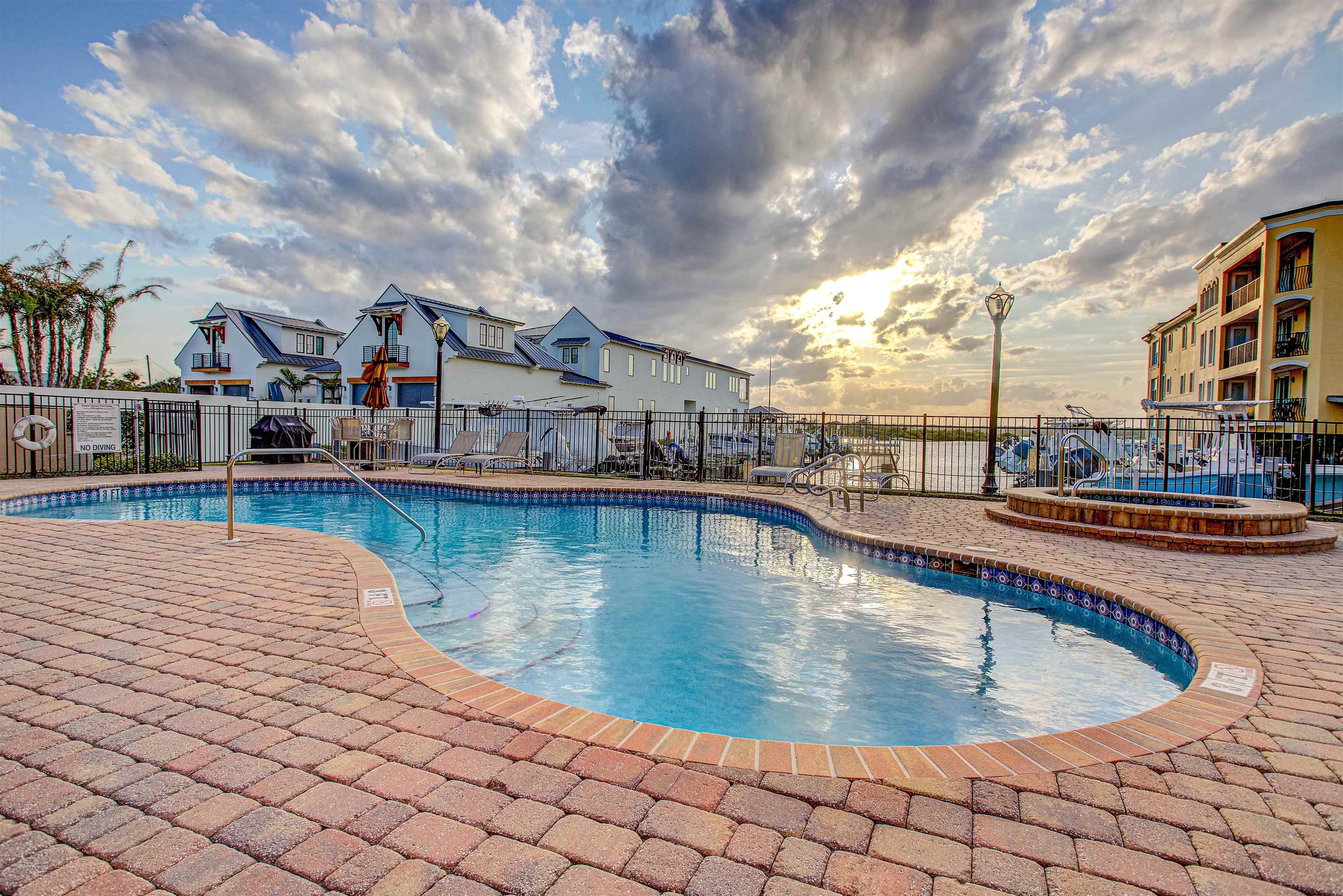 115 Sunset Harbor Way, Unit 303 St. Augustine, FL 32080 - Photo 61 of 76 a view of a swimming pool and a terrace