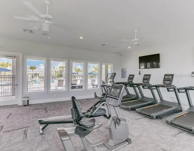 a kitchen with a stove microwave and sink