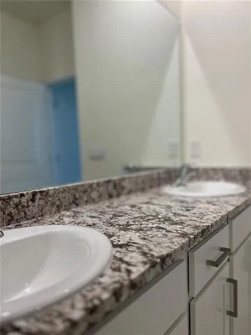 a bathroom with a toilet and a bathtub