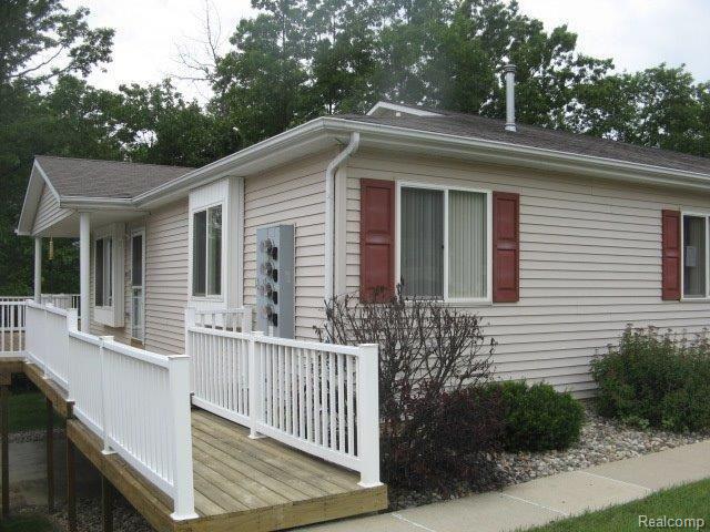 9458 Timber Ridge Drive Grand Blanc, MI 48439 - Photo 3 of 25 Side