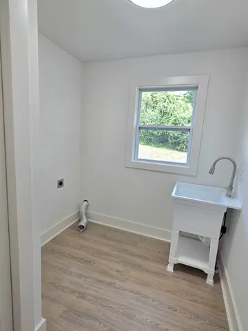 a room with a window and a table