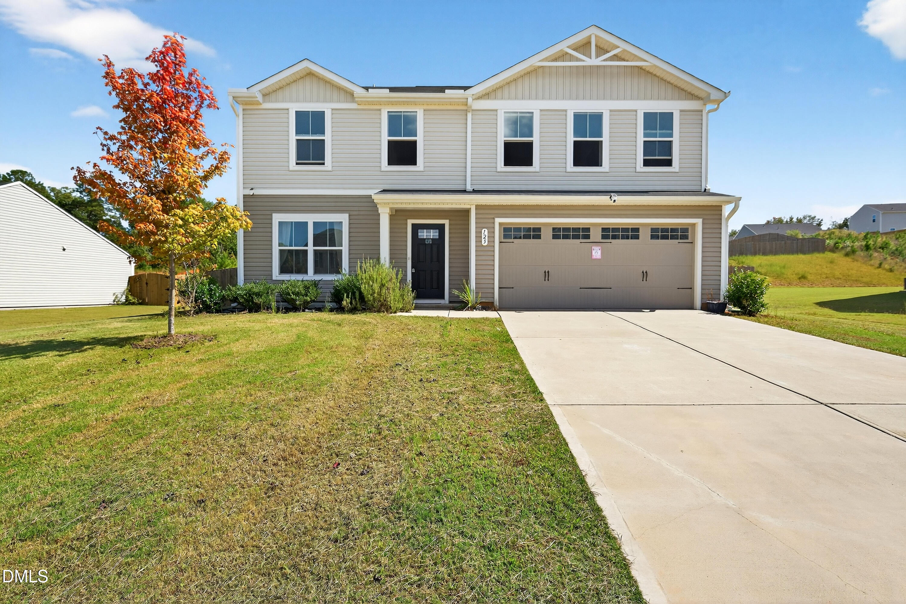 125 Donatella Way Angier, NC 27501 - Photo 1 of 10 a front view of a house with a yard