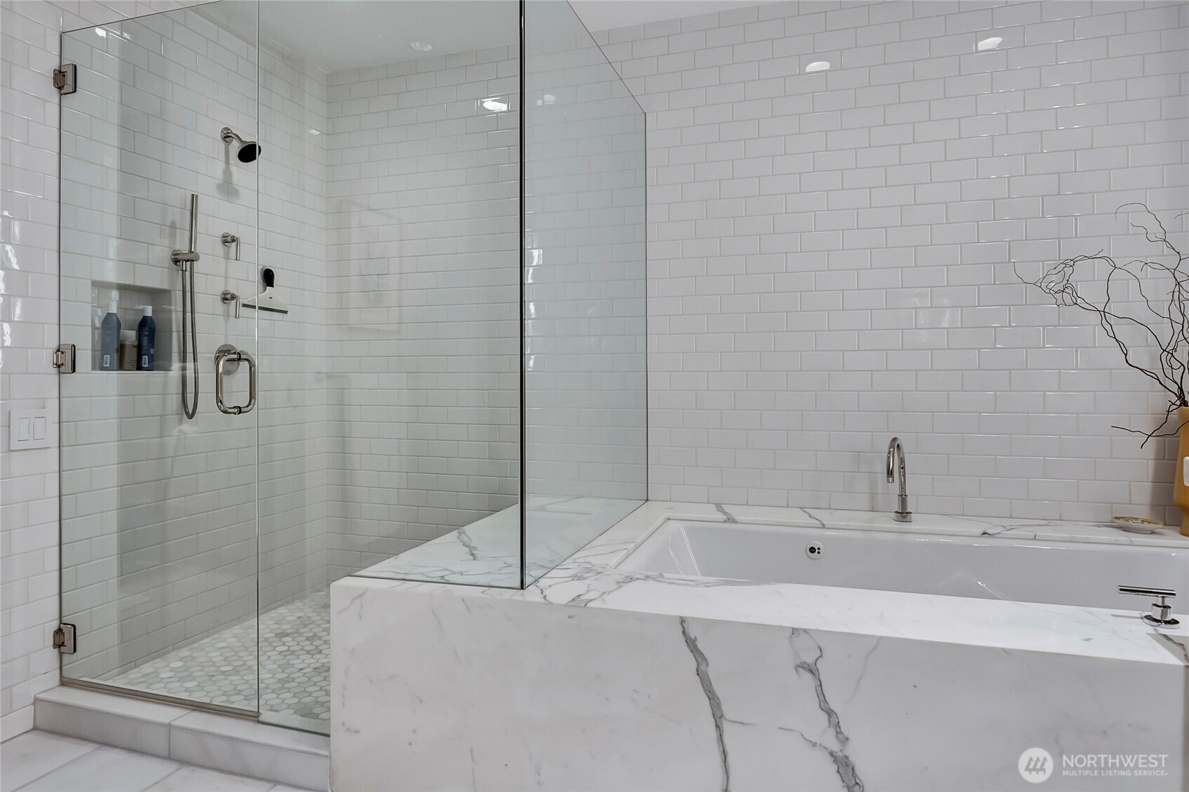 715 2nd Avenue, Unit 1702 Seattle, WA 98104 - Photo 25 of 38 a bathroom with a bathtub and a sink