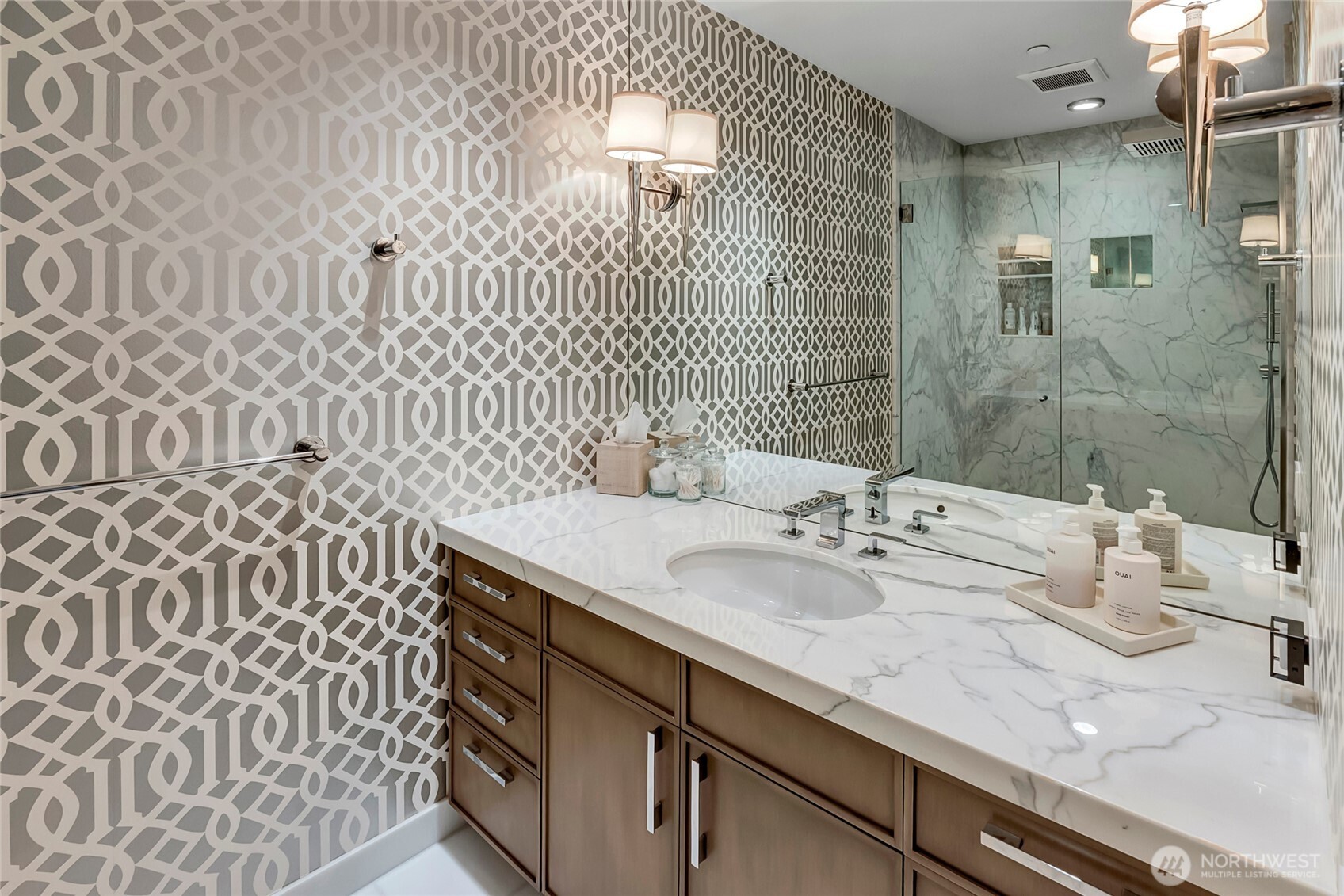 715 2nd Avenue, Unit 1702 Seattle, WA 98104 - Photo 32 of 38 a bathroom with a sink a vanity and a shower