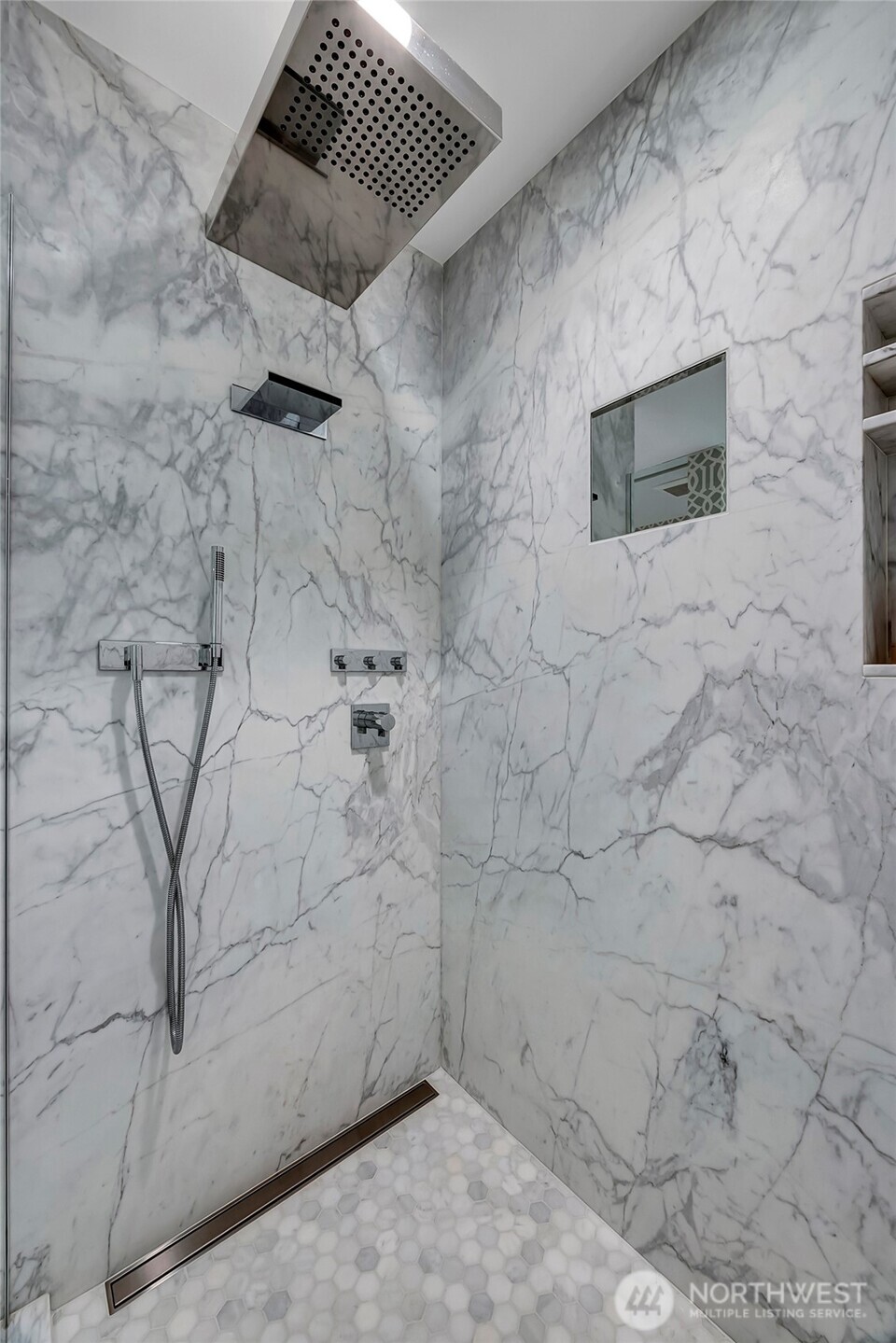 715 2nd Avenue, Unit 1702 Seattle, WA 98104 - Photo 33 of 38 a bathroom with a shower
