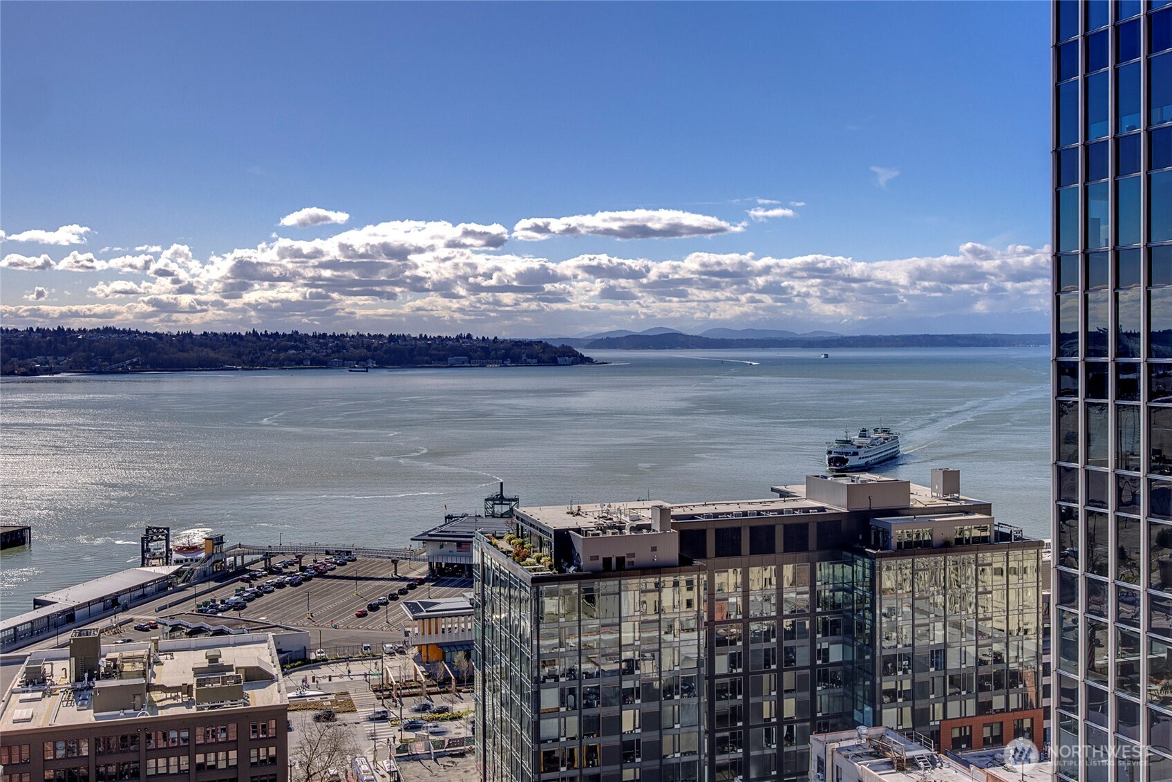 715 2nd Avenue, Unit 1702 Seattle, WA 98104 - Photo 35 of 38 a view of a city and ocean view