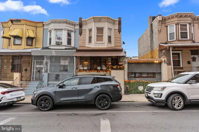 a car parked in front of a house
