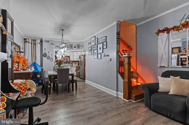 a view of a living room and dining room