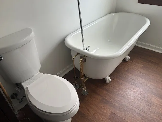 a bathroom with a toilet and a sink