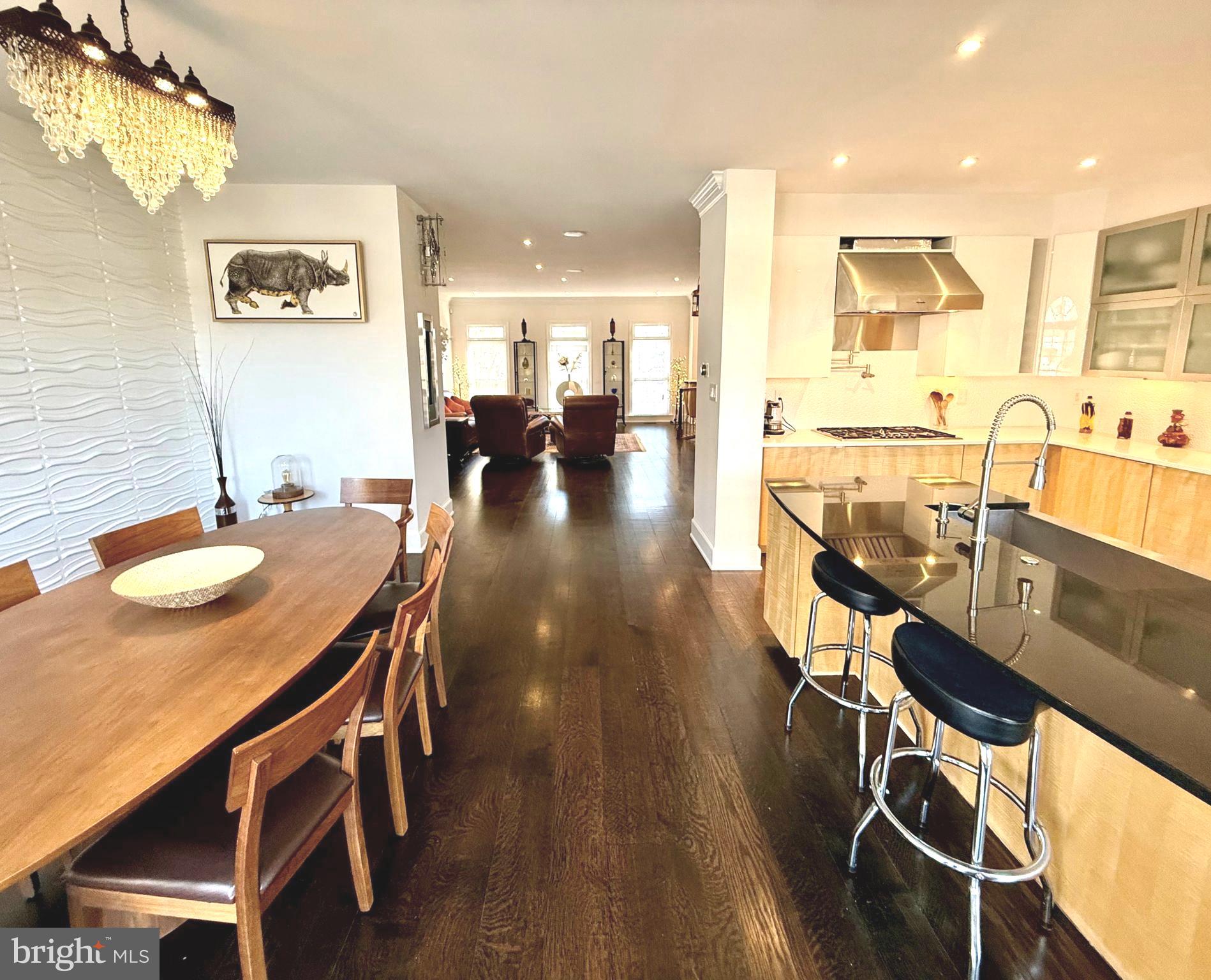 128 Rees Place Falls Church, VA 22046 - Photo 18 of 47 a view of a dining room with furniture and wooden floor