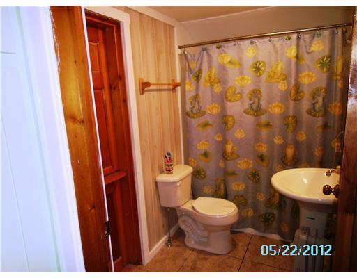 1078 River Road Tenants Harbor, ME 04860 - Photo 10 of 13 Bathroom. Downstairs bath with door...