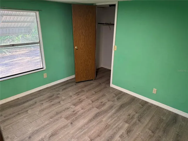 a view of a room that has window in it