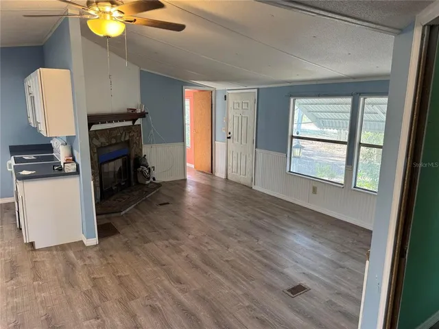 a living room with a fireplace