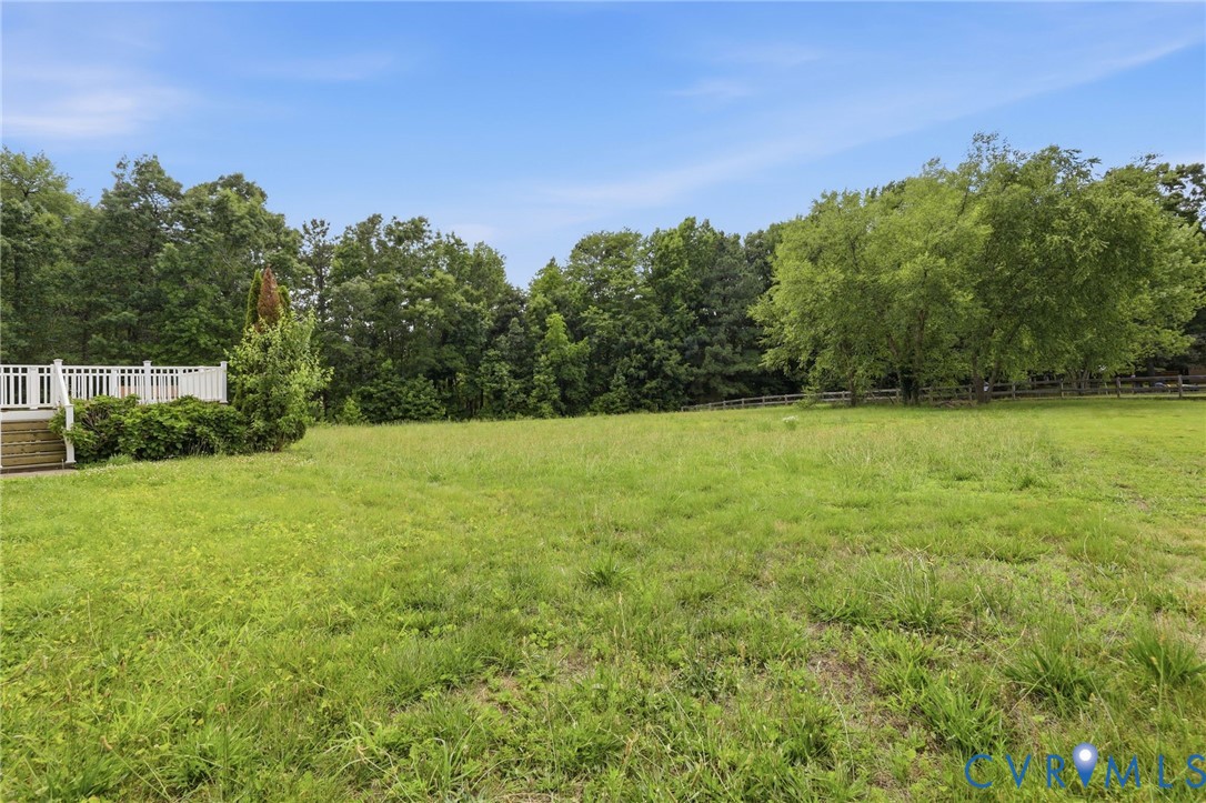4180 Innesbrook Road Glen Allen, VA 23060 - Photo 46 of 54 Expansive green space featuring a white railing de