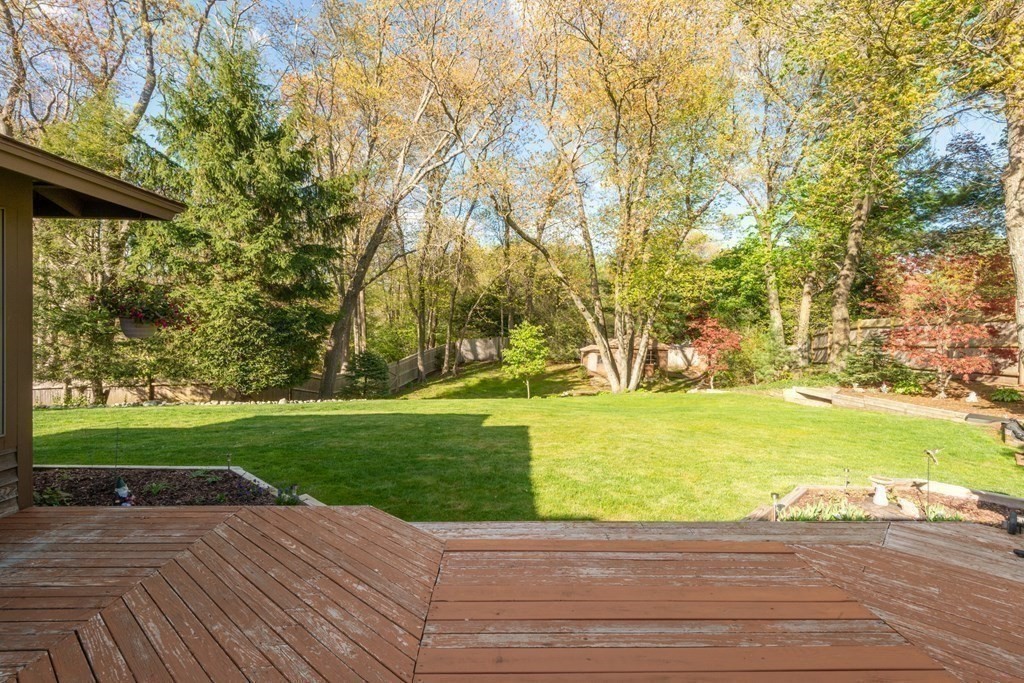 36 Wentworth Road Canton, MA 02021 - Photo 27 of 42 a view of a swimming pool with an outdoor space and seating area
