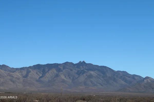 a view of mountains and valleys