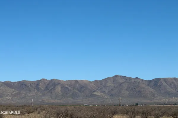 a view of mountains and valleys