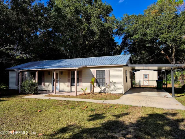 a front view of a house with patio