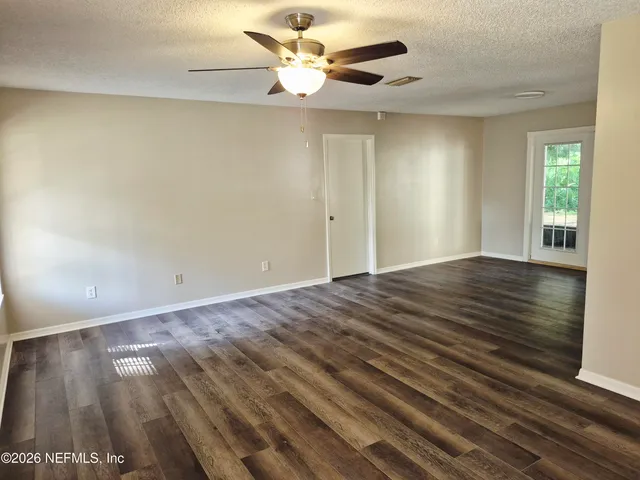 a view of an empty room and window