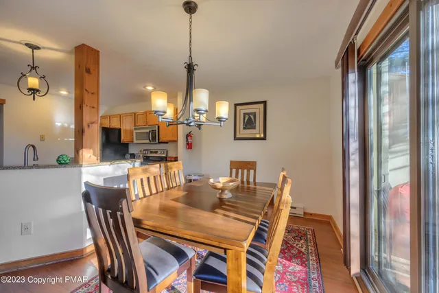 a view of a dining room with furniture