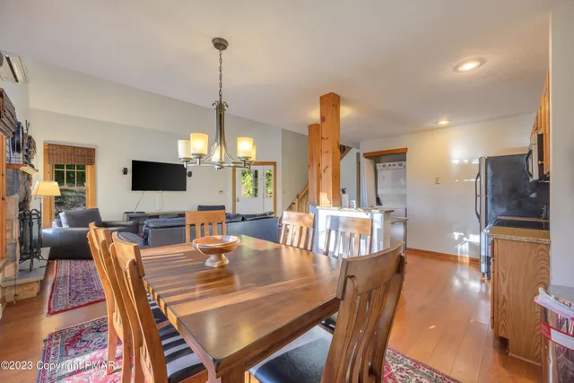 a view of a dining room with furniture