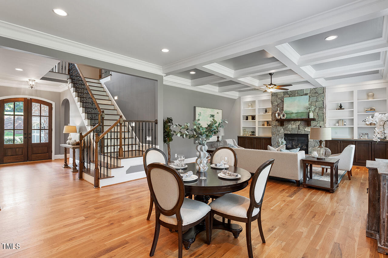 1036 Quiet Ridge Circle Raleigh, NC 27614 - Photo 18 of 60 a dining room with furniture and wooden floor