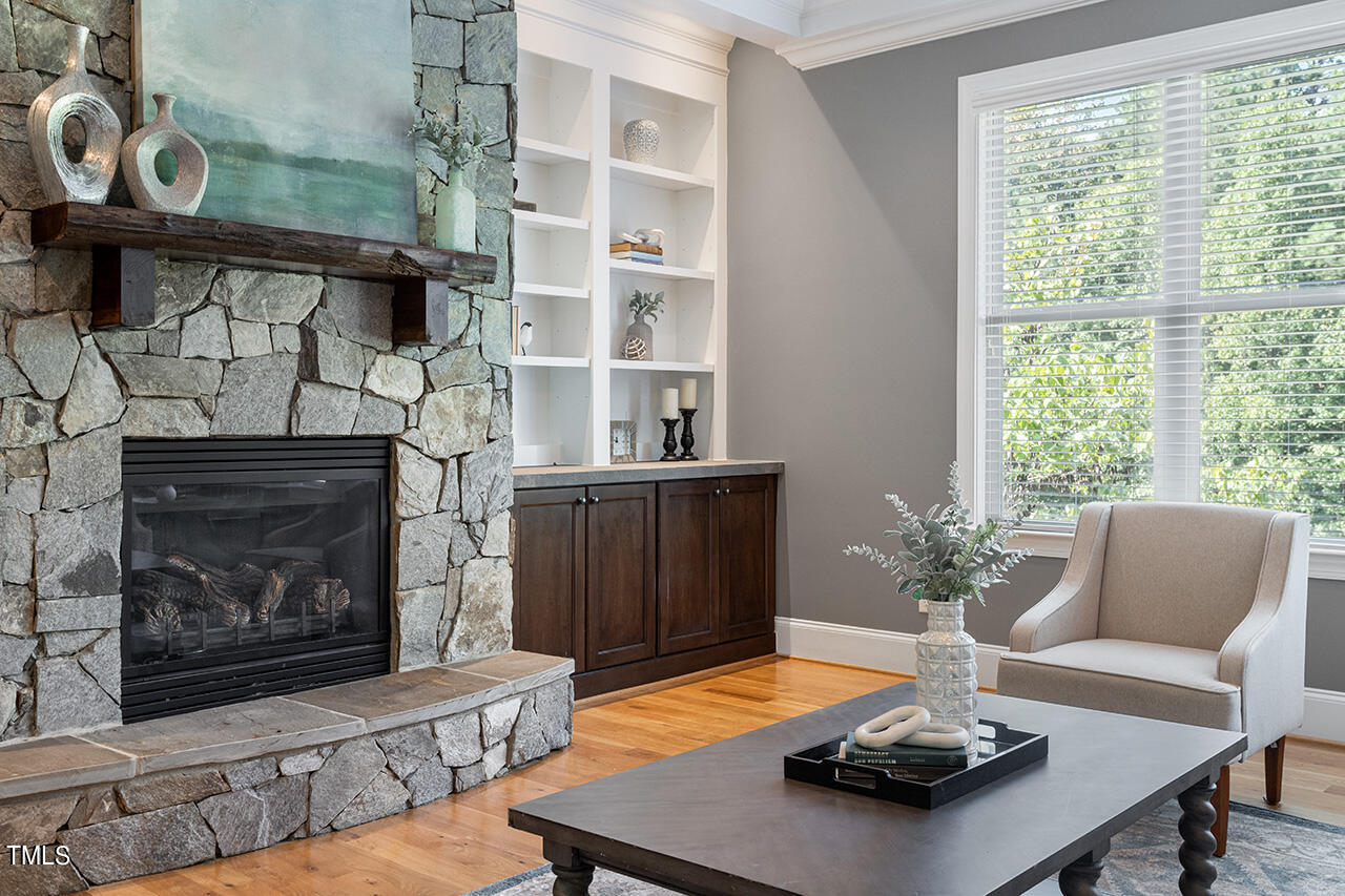 1036 Quiet Ridge Circle Raleigh, NC 27614 - Photo 20 of 60 a living room with furniture and a fireplace