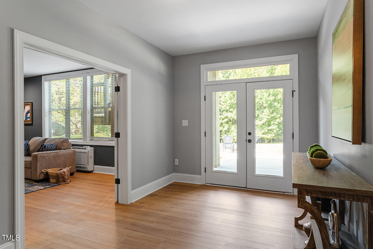 1036 Quiet Ridge Circle Raleigh, NC 27614 - Photo 28 of 60 a view of a livingroom with furniture and windows