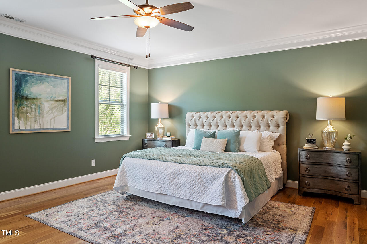 1036 Quiet Ridge Circle Raleigh, NC 27614 - Photo 37 of 60 a bedroom with a bed and a window