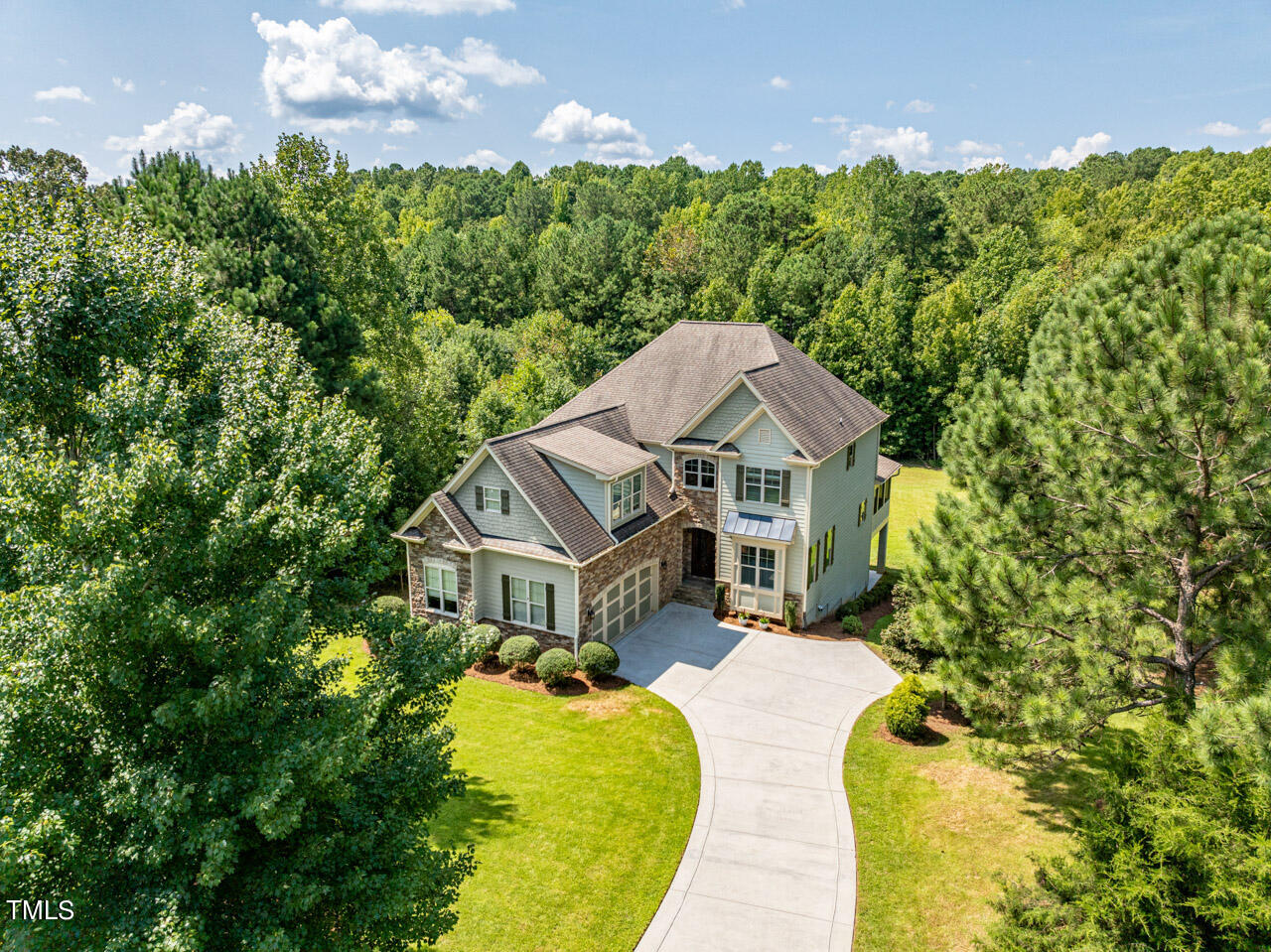 1036 Quiet Ridge Circle Raleigh, NC 27614 - Photo 52 of 60 a aerial view of a house with a big yard and large trees