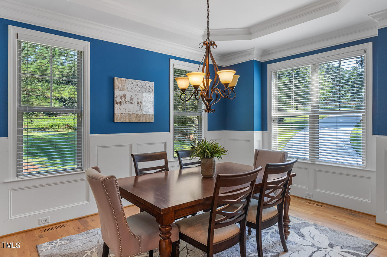 1036 Quiet Ridge Circle Raleigh, NC 27614 - Photo 7 of 60 a view of a dining room with furniture window and outside view